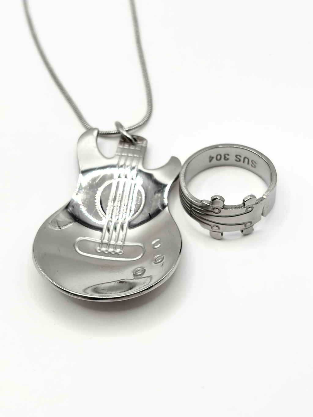 Custom gitaar ring/ketting