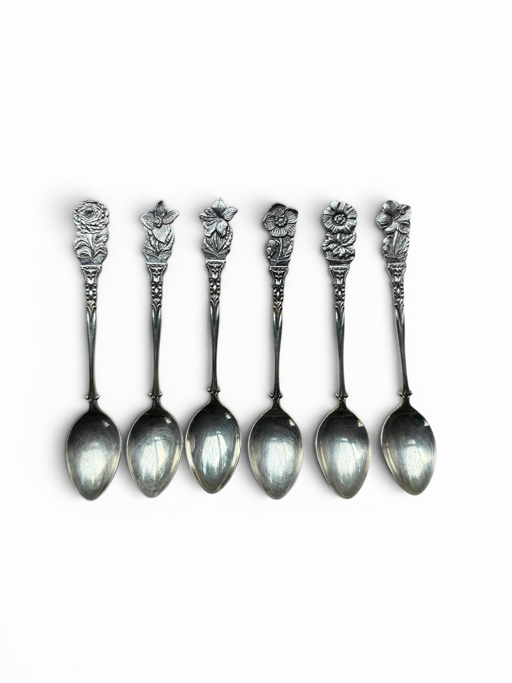 Smitsjewellery set of 6 silver-plated spoons with ornate floral handles, perfect for tea or dessert.