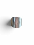 Smitsjewellery silver statement ring with a polished, elongated architectural silhouette and smooth surface.