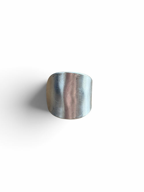 Smitsjewellery silver statement ring with a polished, elongated architectural silhouette and smooth surface.